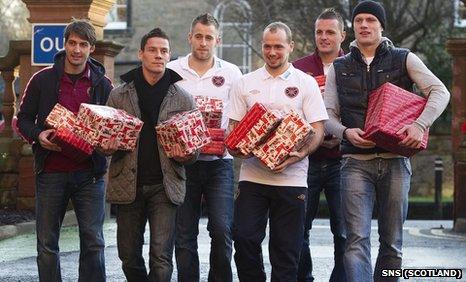 Hearts players (from left) Rudi Skacel, Ian Black, Danny Grainger, Jamie Hamill, Marian Kello and Marius Zaliukas arrive at the Royal Hospital for Sick Children to give presents to kids