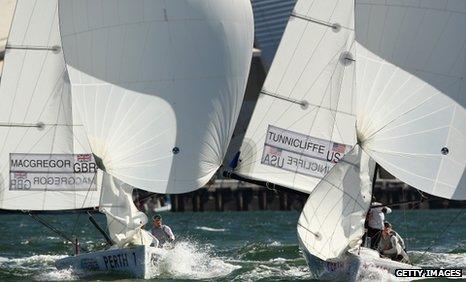 The Great Britain boat skippered by Lucy MacGregor races side by side with the United States boat skippered by Anna Tunnicliffe