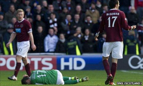 Ivan Sproule is grounded after an altercation with Ryan McGowan