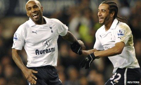 Jermain Defoe (left) celebrates his goal with Benoit Assou-Ekotto