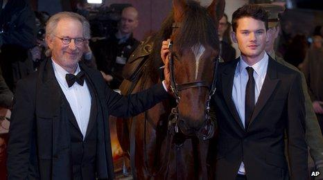 Steven Spielberg, Jeremy Irvine, with horse