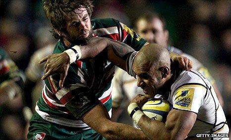 Geoff Parling (left) tackles Wasps' former Leicester winger Tom Varndell