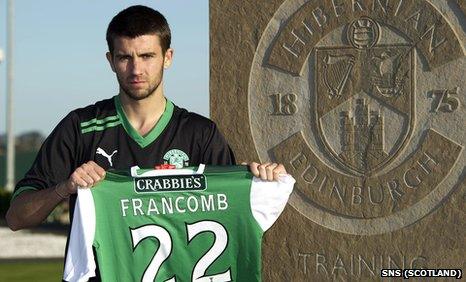 George Francomb shows off his new Hibs shirt