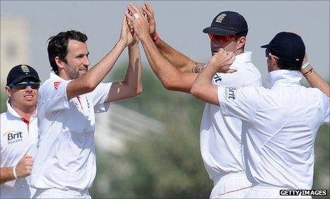 Graham Onions celebrates with his teammates after he dismissed Muhammad Ayub