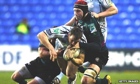 Cardiff Blues' Sam Warburton is tackled by London Irish's Nick Kennedy