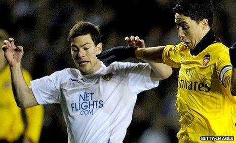 Ben Parker (left) tussles with then Arsenal midfielder Samir Nasri during last season's FA Cup