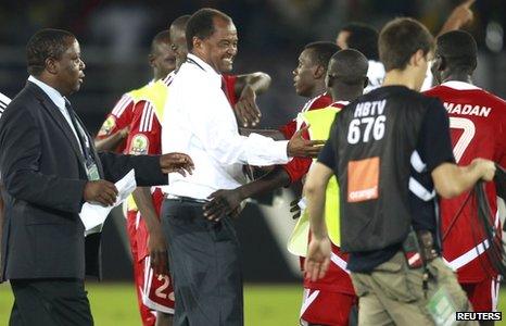 Sudan coach Mohamed 'Mazda' Abdallah celebrates with his players