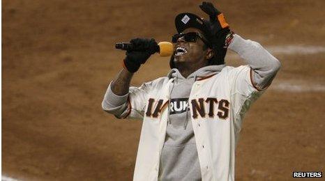 Rapper Lil Wayne sings at a baseball game