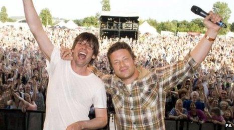 Alex James (left) and Jamie Oliver on stage at the Big Feastival on Saturday