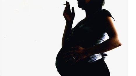 Pregnant woman smoking