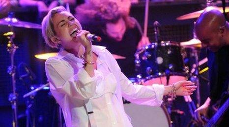 Miley Cyrus performing on Late Night With Jimmy Fallon