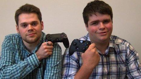 Gamers holding controllers