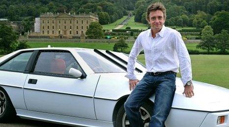 Richard Hammond sat on a car