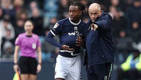 Millwall boss Alex Neil (right)
