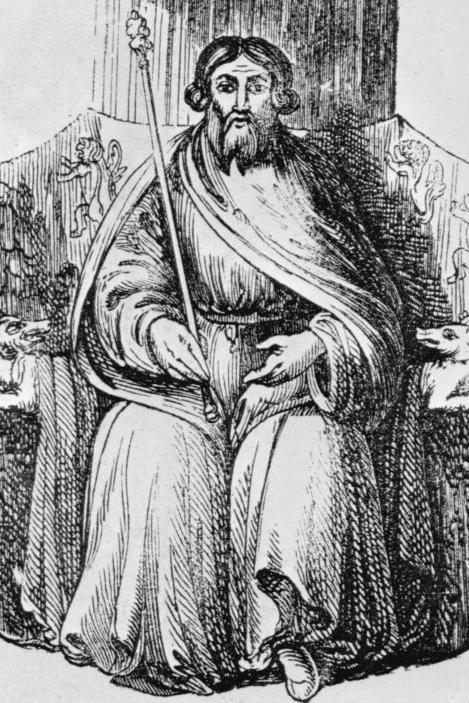 A black and white sketch shows an imagined picture of Owain Glyndwr with long hair, a beard, wearing robes