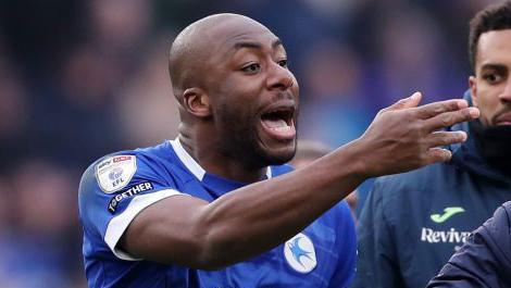 Yakou Meite gestures during a game