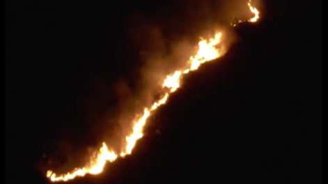 Gorse fire flames seen from above above Abersoch