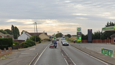 Street view of the A47 with the BP garage and Thorney Toll service building on the right 