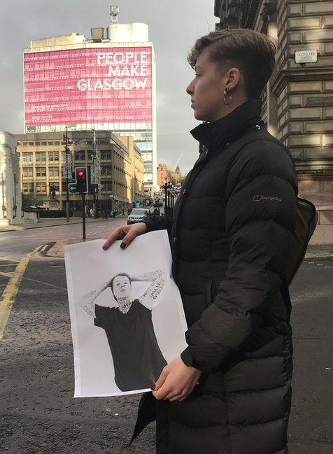 Eliza Coulson holding her photo