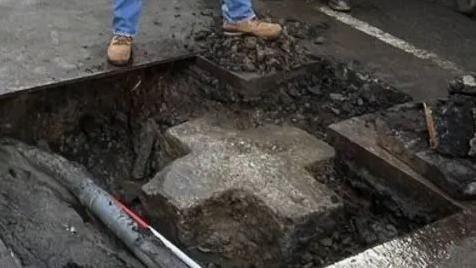 A cross in the ground