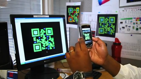 Resesarcher demos the invisible QR code