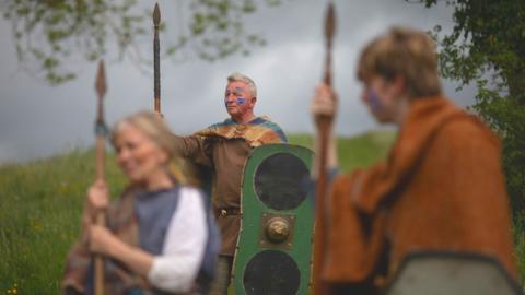 warriors_holding_spears.