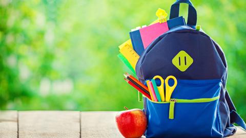 School bag with stationary in it.