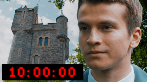 Gabriel is looking at a tower with a 10 minute timer below him