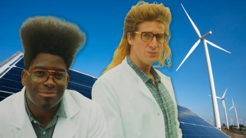 Two scientists in front of solar panels and wind turbines