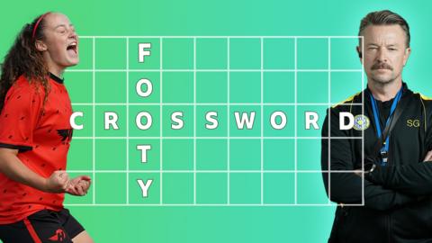 Christina and Mr Spence pose either side of a table with the words 'footy' and 'crossword' in it