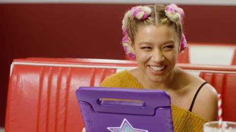 Nova Jones played by Mollie Rainford laughs at something off camera in this behind the scenes blooper reel.