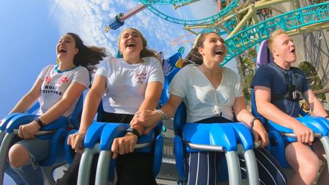 Holly, Tilly, Megan, and Jack on a rollercoaster