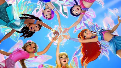 The Winx Club members are holding hands and smiling while surrounded by magic