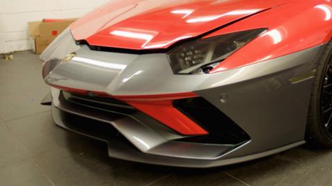 A red and grey sportscar.