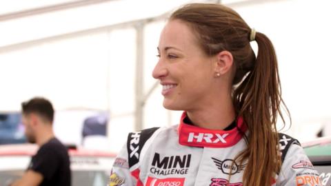 Rebecca from Ali-A's Superchargers in a racing suit.