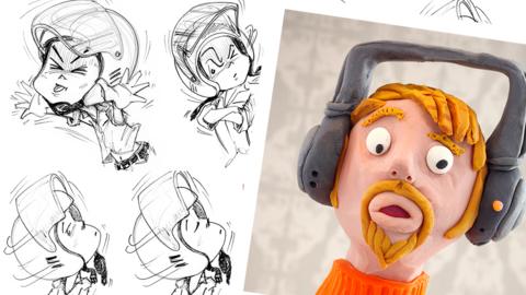A clay figure on some sketches