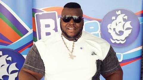 Iron Biby, a weightlifter with very big muscles.