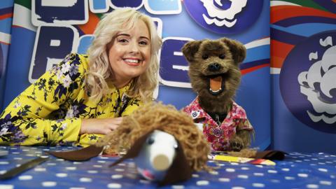 Katie and Hacker with a dog pencil pot.