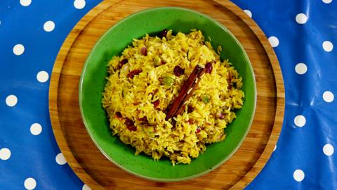 Biryani rice with pistachios and cranberries in it.