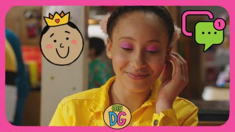 Candi-rose is looking down and smiling. She is holding an ear bud to her ear.