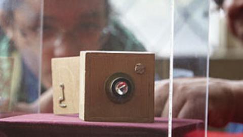 The world's first pinhole camera in a glass box.