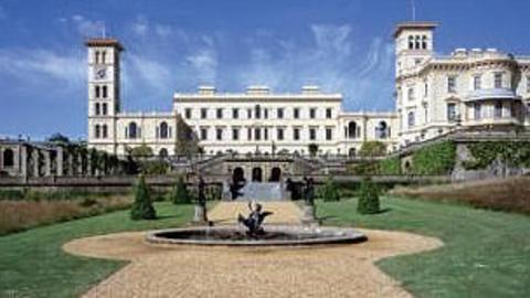 Osbourne House, a large white mansion with tall towers on the left and right of the building.