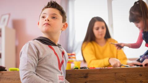 Boy playing indoors.