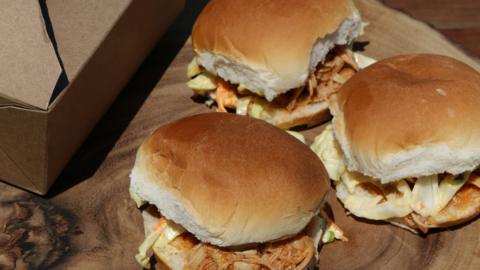 Three chicken burgers.