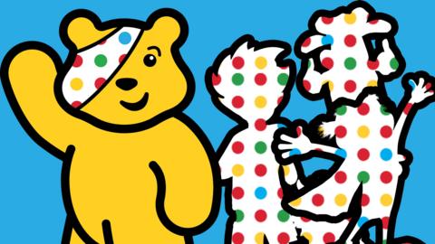 Pudsey the Bear with polka-dot silhouettes.