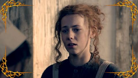 A Victorian girl looks shocked by someone. From CBBC series Hetty Feather.