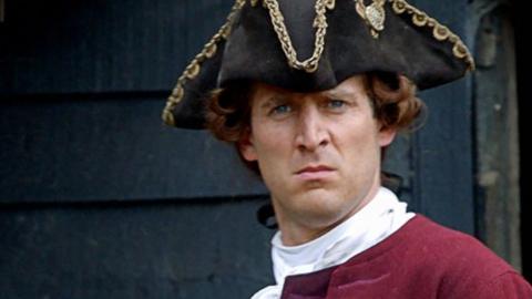 A man (Prince William of Cumberland) wearing a tree sided hat.