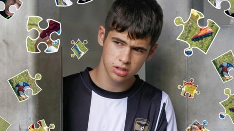 Jamie surrounded by jigsaw pieces