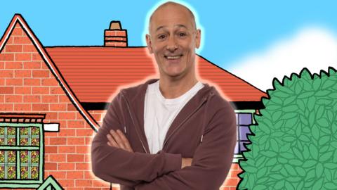 A man folding his arms against a cartoon background. Mike from The Dumping Ground.