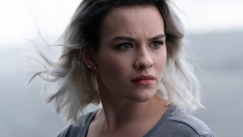 Issie from Mystic smiling.